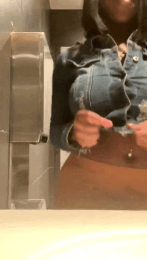 Girlfriend flashes her big tits in restaurant bathroom