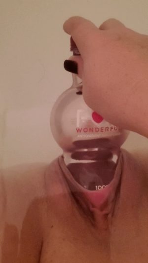 Wife fucks pussy with pom bottle because she knows it is too loose for cock
